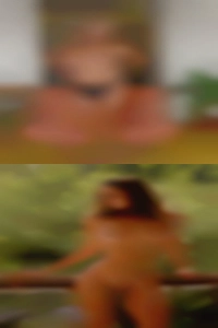 Horny woman swinging teas penis.